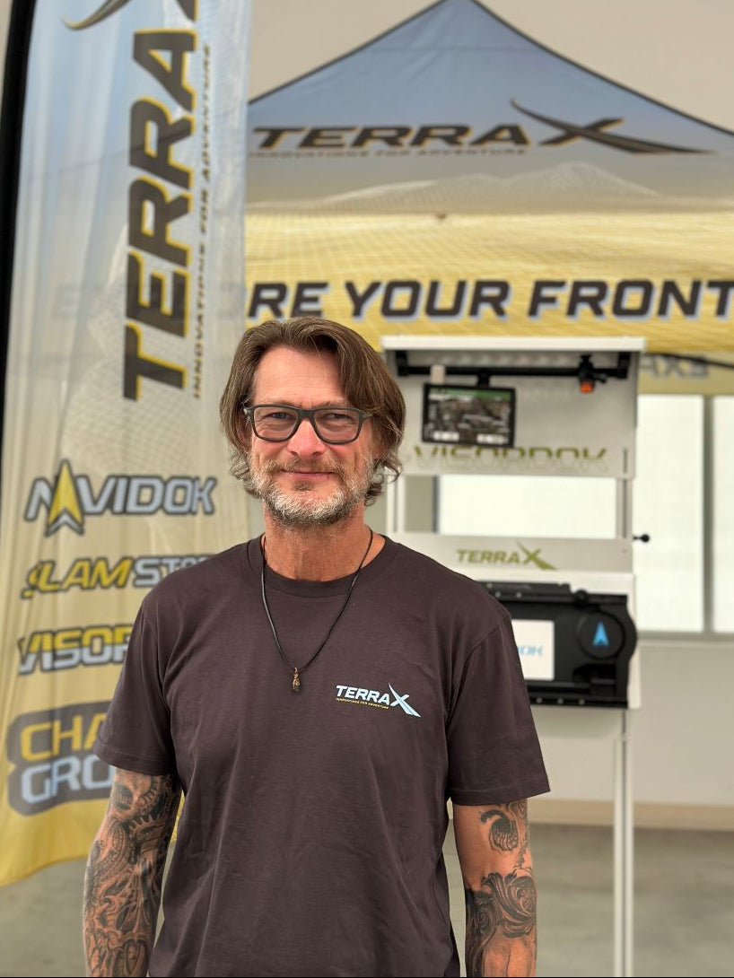 Terra X co-founder Alex developing and assembling heavy-duty, drill-free van mounting systems in the workshop.