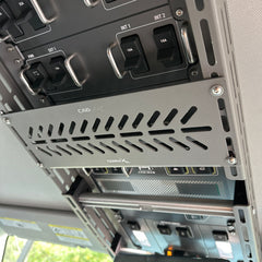 Cabdok Molle Storage Panel installed in Ineos Grenadier overhead console, routed arrow pattern between switch panels