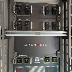 Cabdok mounted in Ineos Grenadier cab with switch panel and TubeTrak accessory rail installed